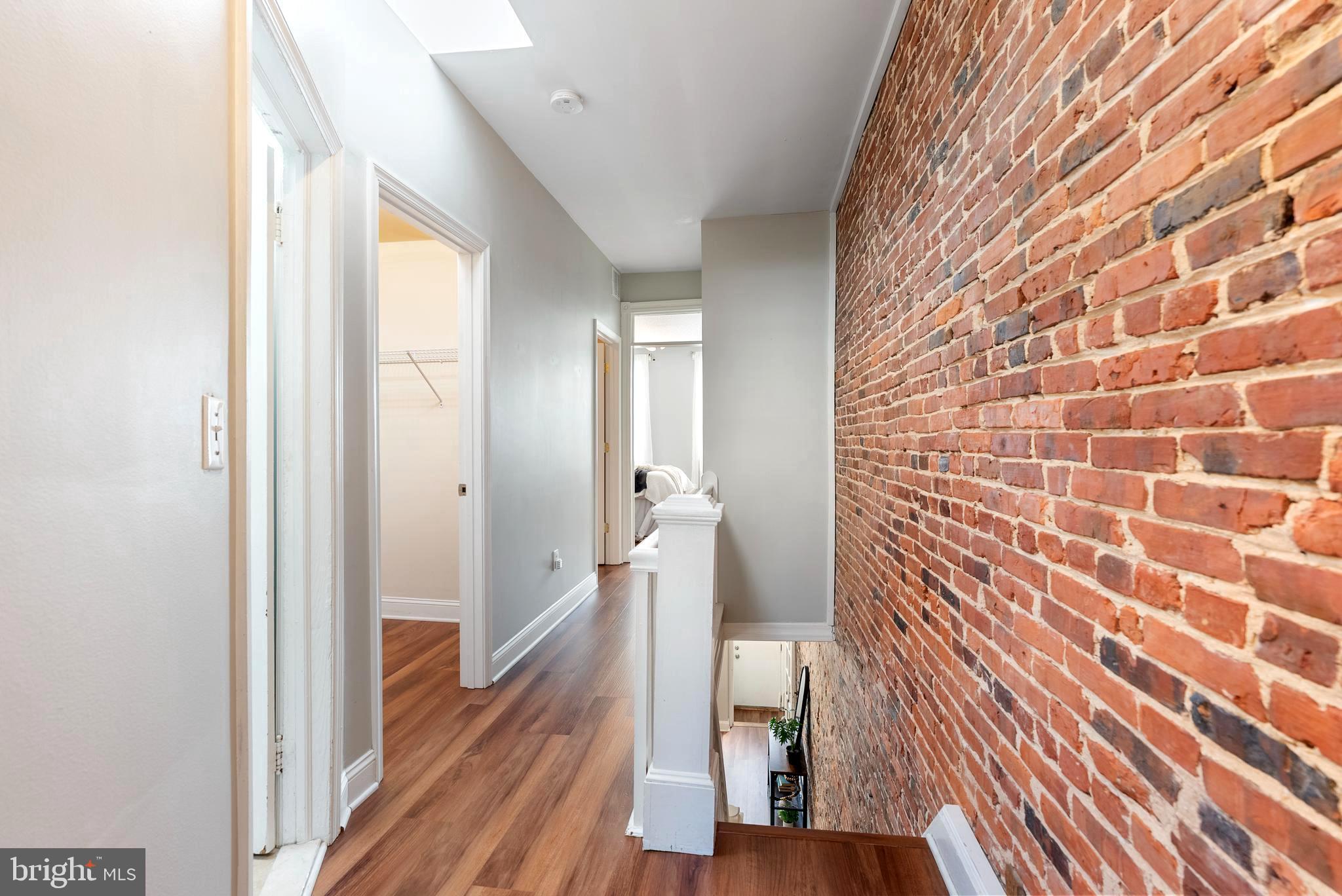 280 South Robinson Street Baltimore, MD 21224 - Photo 17 of 40 a view of a bathroom from the hallway