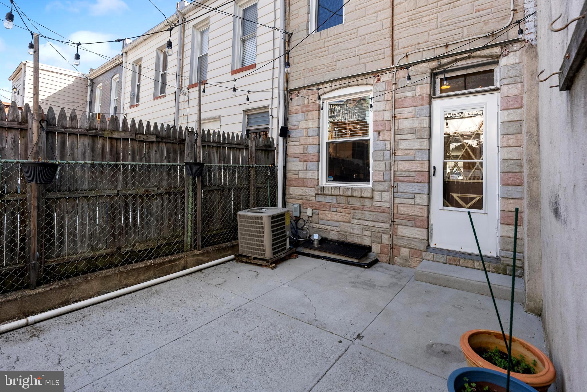280 South Robinson Street Baltimore, MD 21224 - Photo 37 of 40 a view of a balcony with chairs
