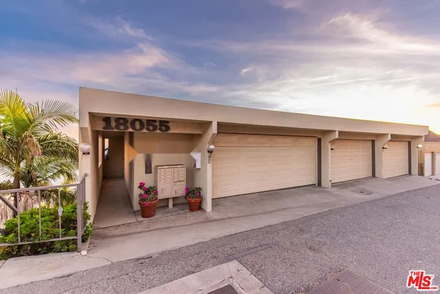 a view of a house with a garage