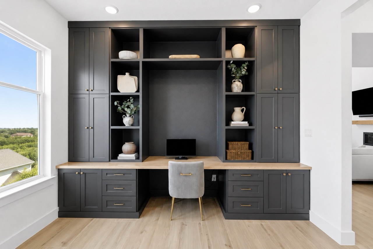 836 Villa Rialto View Leander, TX 78641 - Photo 21 of 33 Integrated built-in cabinetry and workspace create a functional and stylish home office environment.