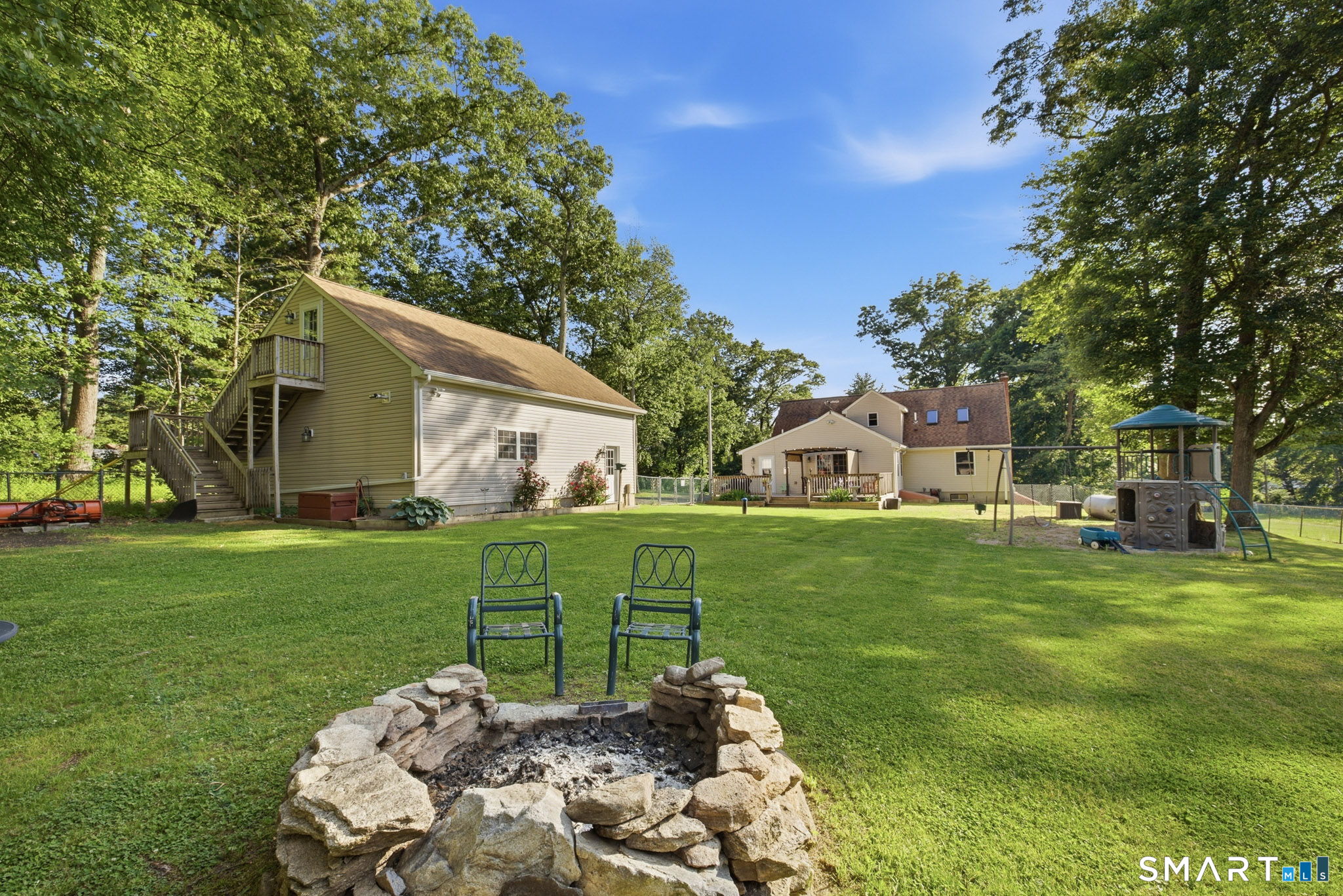 141 Hop River Road Coventry, CT 06238 - Photo 31 of 40 a front view of a house with garden
