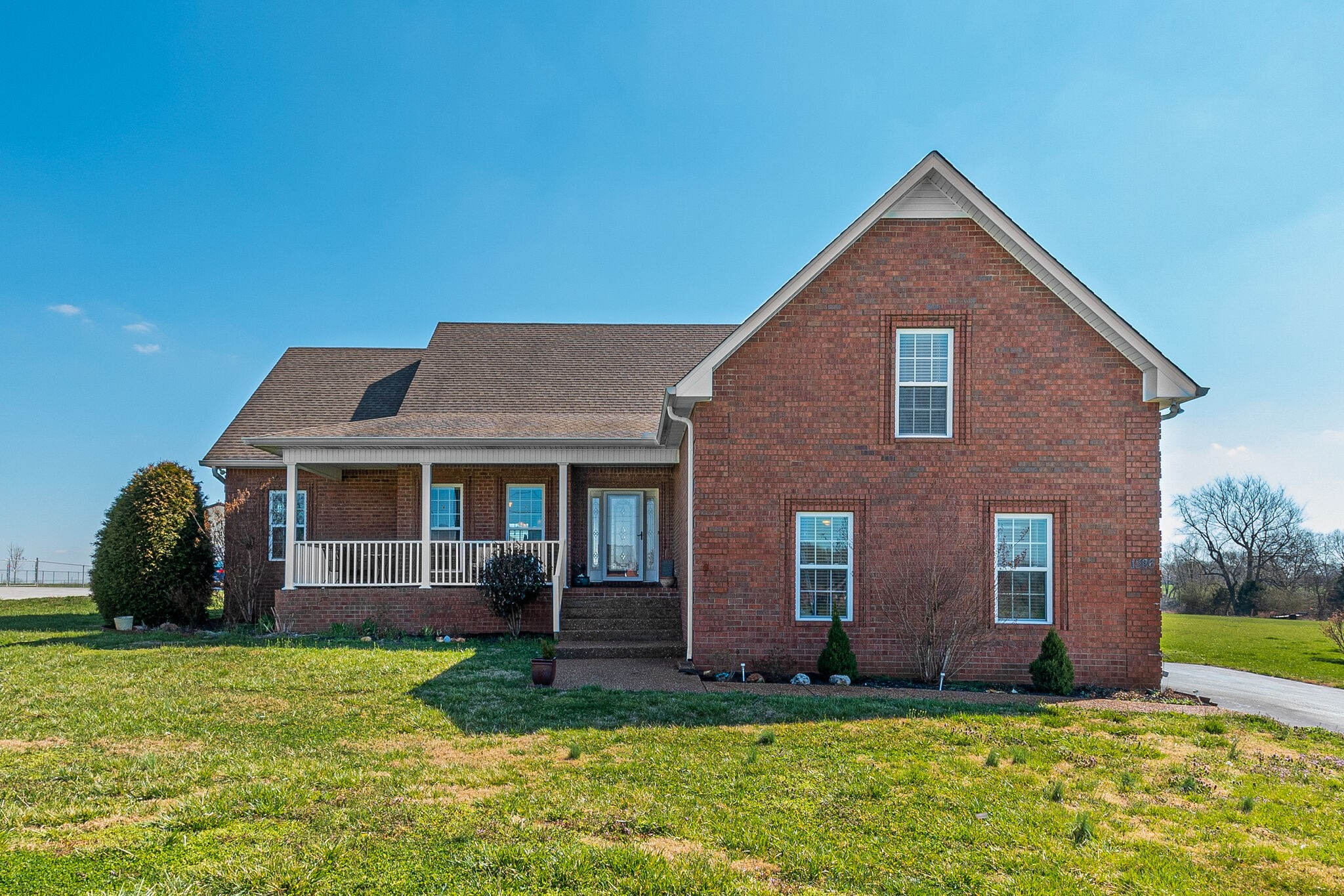 1586 Maxwell Branch Road Cottontown, TN 37048 - Photo 1 of 32 a view of a house with a yard