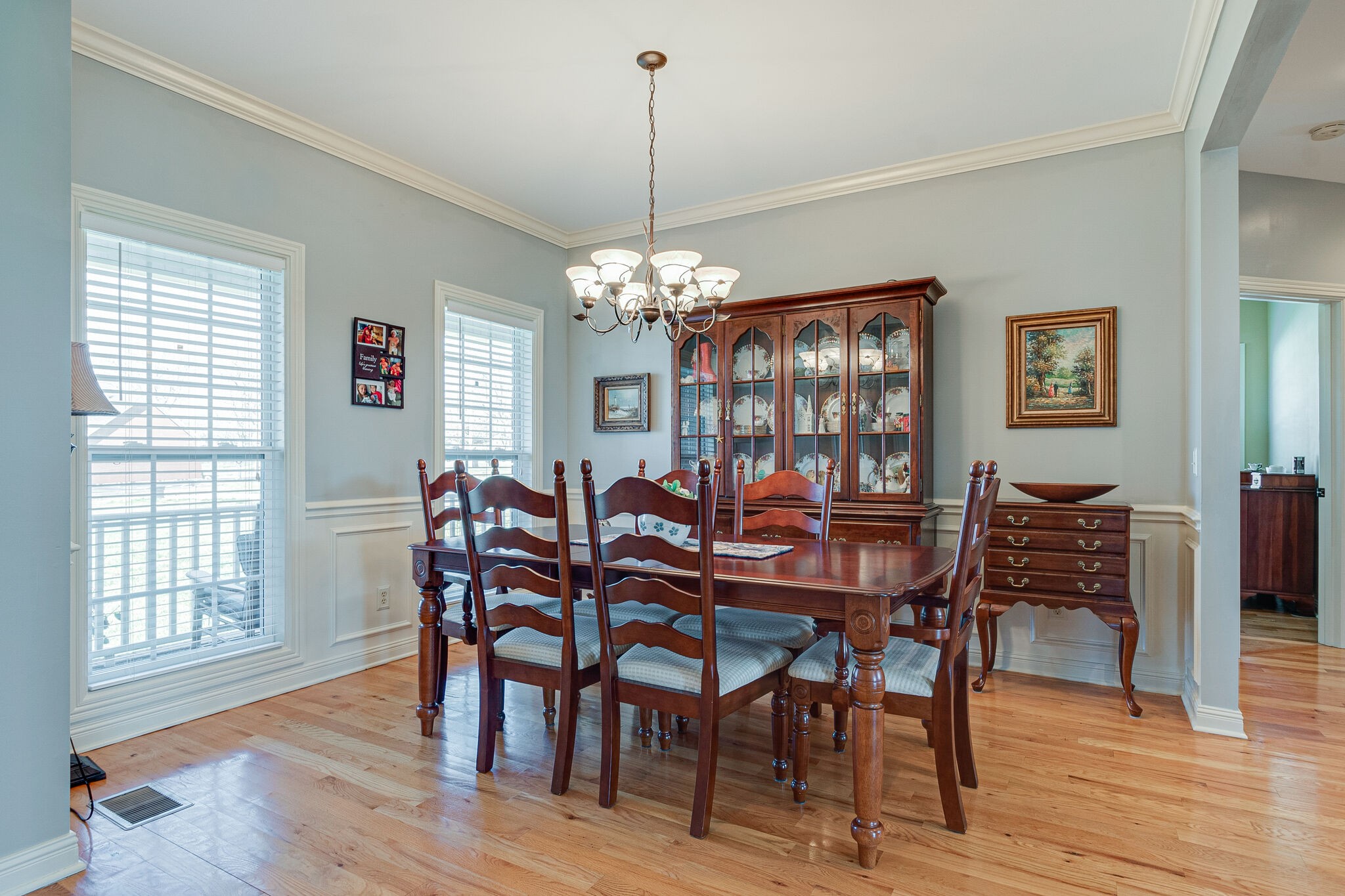 1586 Maxwell Branch Road Cottontown, TN 37048 - Photo 7 of 32 a view of a dining room with furniture window and wooden floor