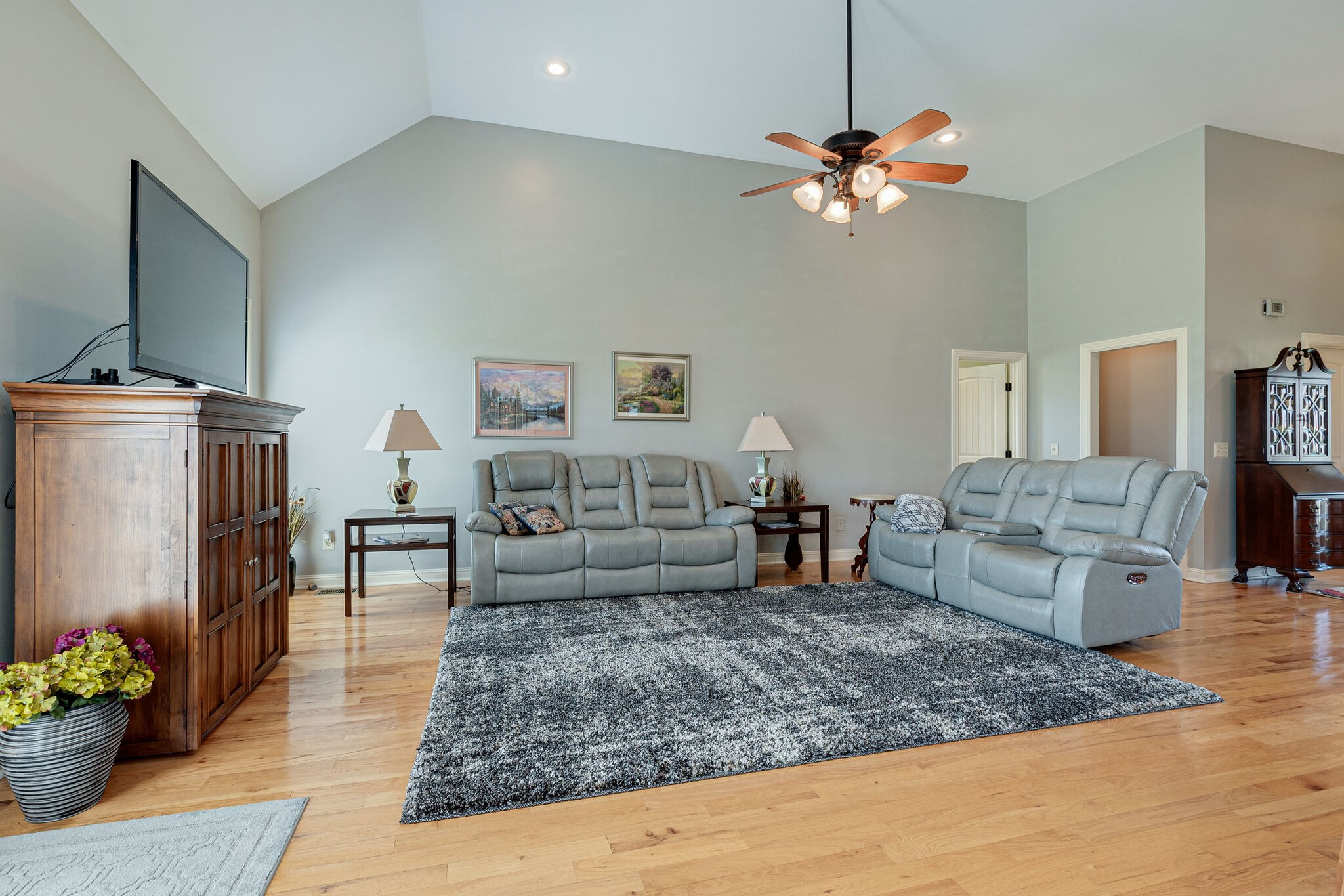 1586 Maxwell Branch Road Cottontown, TN 37048 - Photo 10 of 32 a living room with furniture and a chandelier