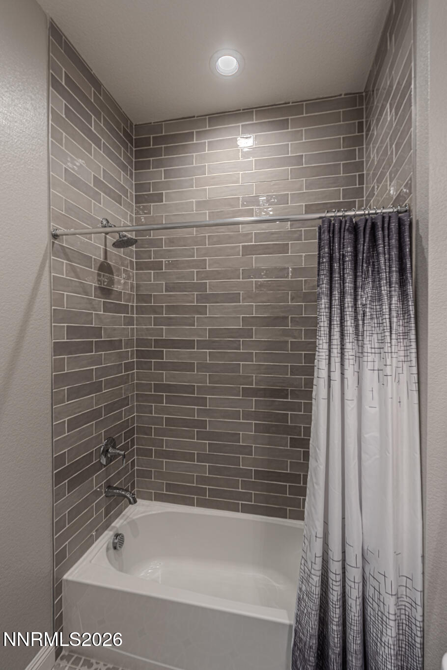 2109 Cast Iron Drive Reno, NV 89521 - Photo 22 of 35 a bathroom with a shower and a bathtub
