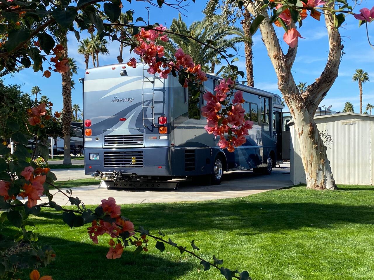 a childrens park with lots of swings and slides