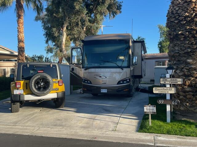 84136 Ave 44, Unit 59 Indio, CA 92203 - Photo 2 of 8 a car parked on the side of the road