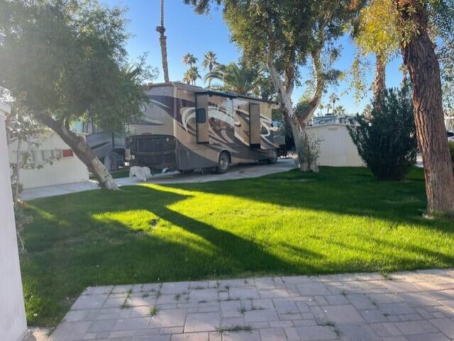 84136 Ave 44, Unit 59 Indio, CA 92203 - Photo 8 of 8 a view of a backyard with swimming pool
