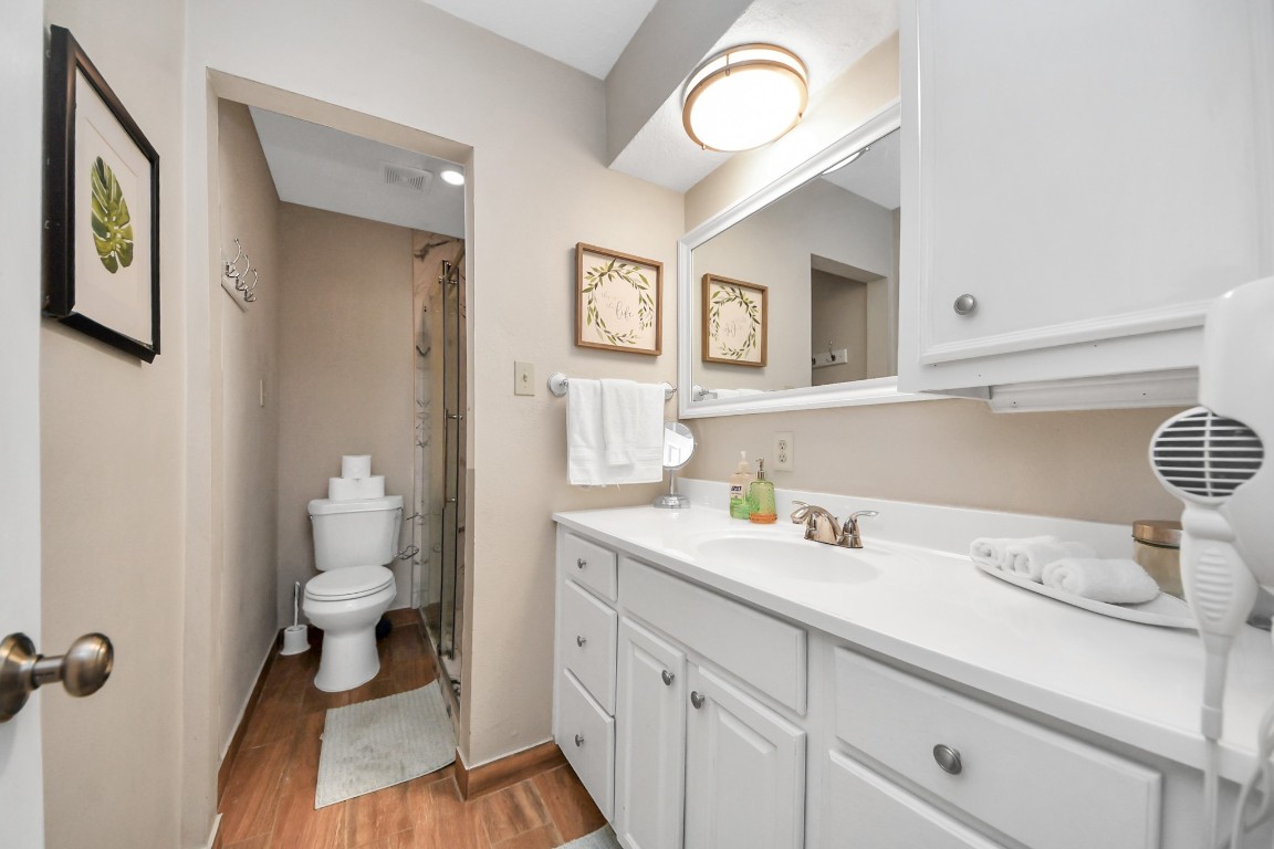 25803 Timber Lakes Drive Spring, TX 77380 - Photo 24 of 48 a bathroom with a sink and a toilet