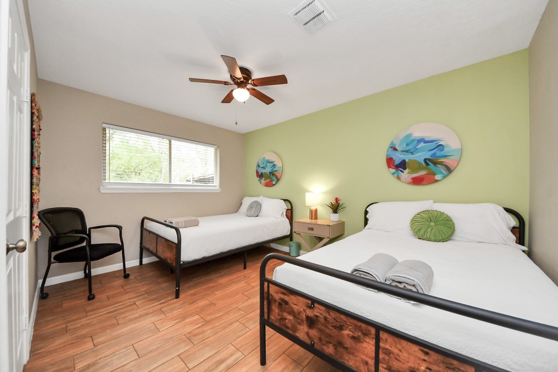 25803 Timber Lakes Drive Spring, TX 77380 - Photo 27 of 48 a bedroom with two beds and a window