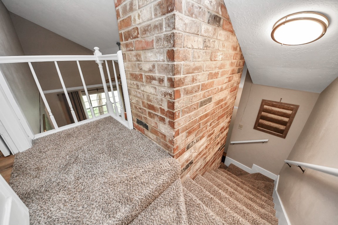 25803 Timber Lakes Drive Spring, TX 77380 - Photo 31 of 48 a view of a livingroom with furniture and staircase