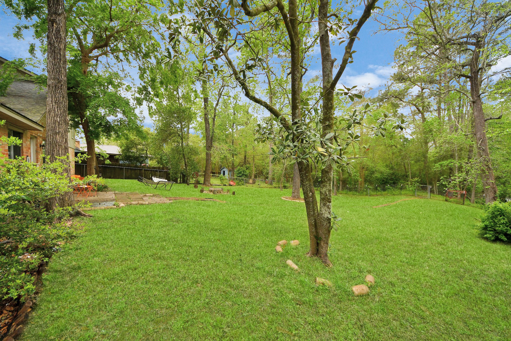 25803 Timber Lakes Drive Spring, TX 77380 - Photo 47 of 48 a view of a yard with a tree