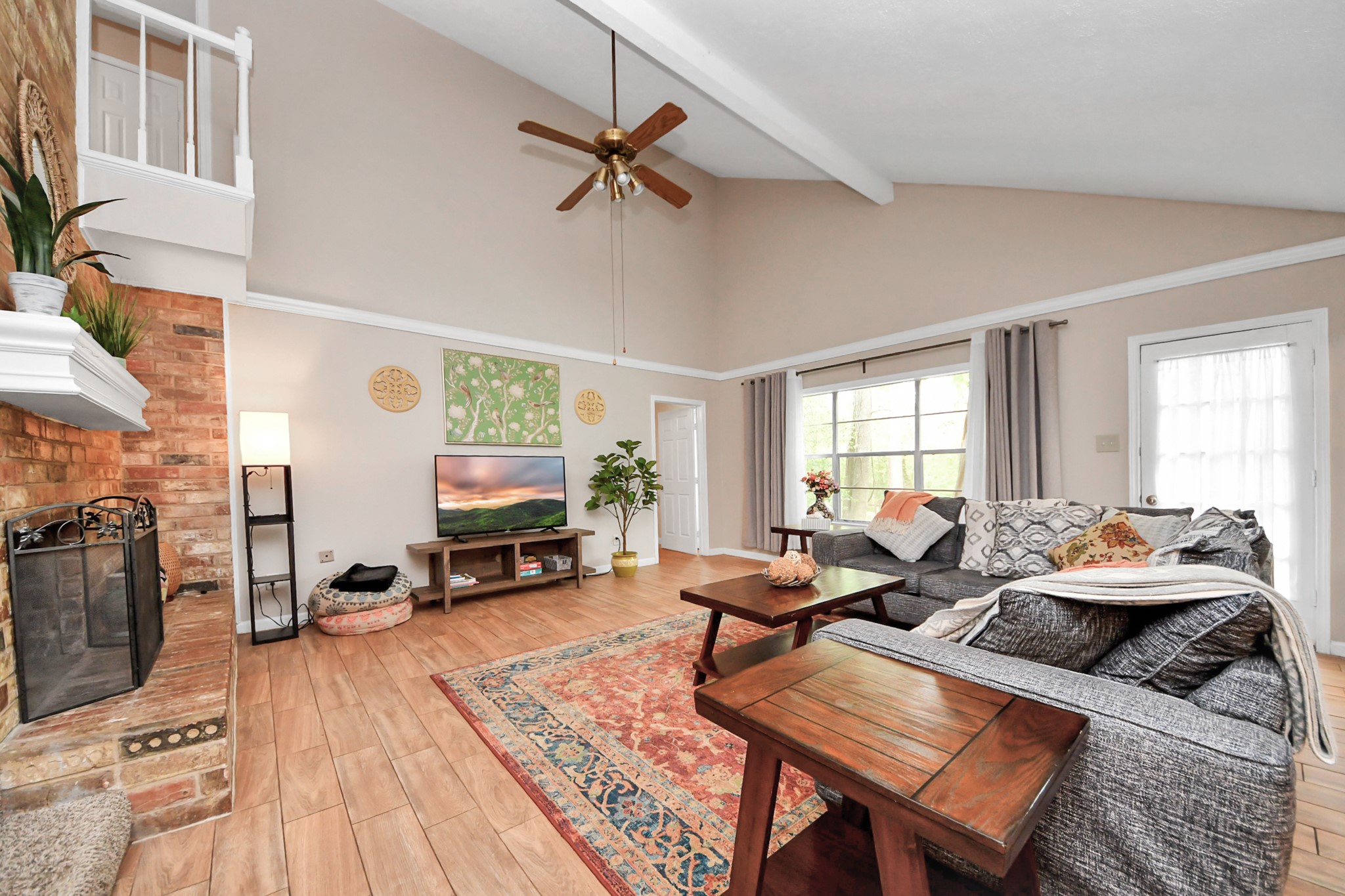 25803 Timber Lakes Drive Spring, TX 77380 - Photo 5 of 48 a living room with furniture and a fireplace