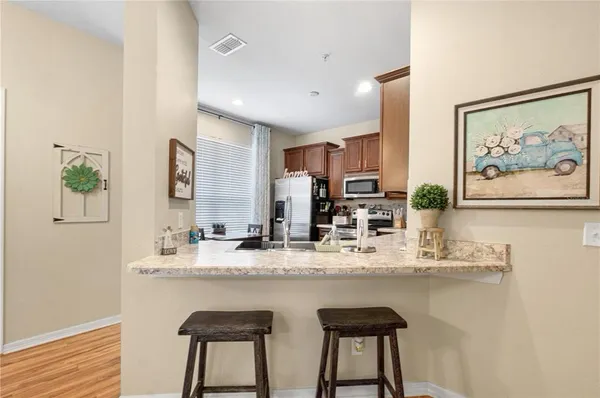 $329,900 | 15350 Oak Apple Court, Unit 17B, Winter Garden, FL 34787