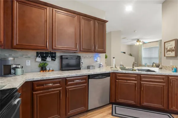 $329,900 | 15350 Oak Apple Court, Unit 17B, Winter Garden, FL 34787
