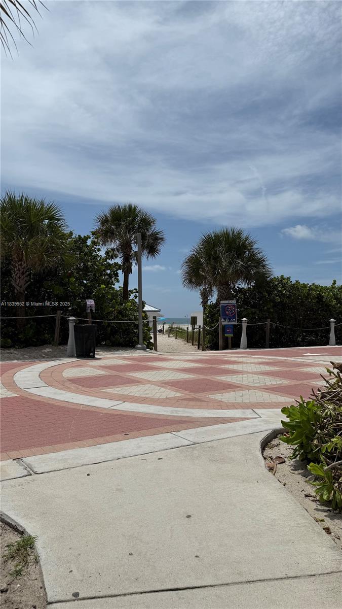 6000 Collins Avenue, Unit 323 Miami Beach, FL 33140 - Photo 33 of 35 view of a terrace