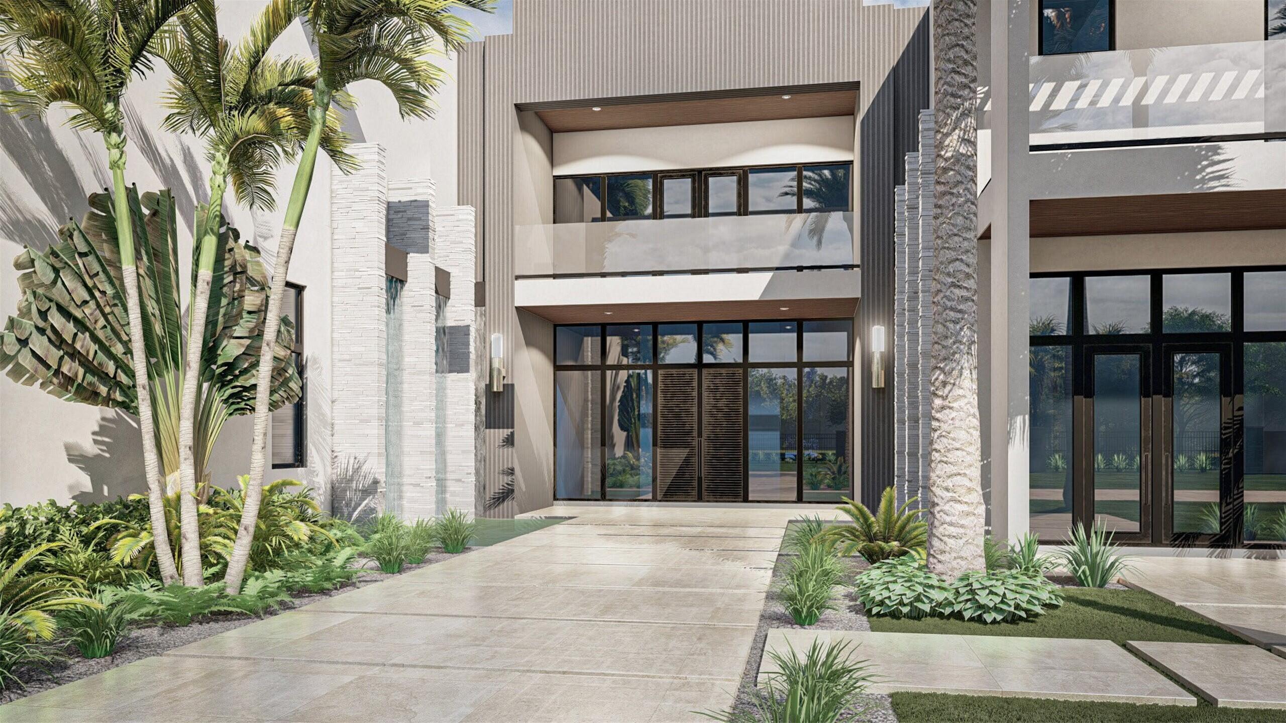 5650 Southwest 192nd Terrace Southwest Ranches, FL 33332 - Photo 19 of 29 a view of a brick house with a large windows and plants