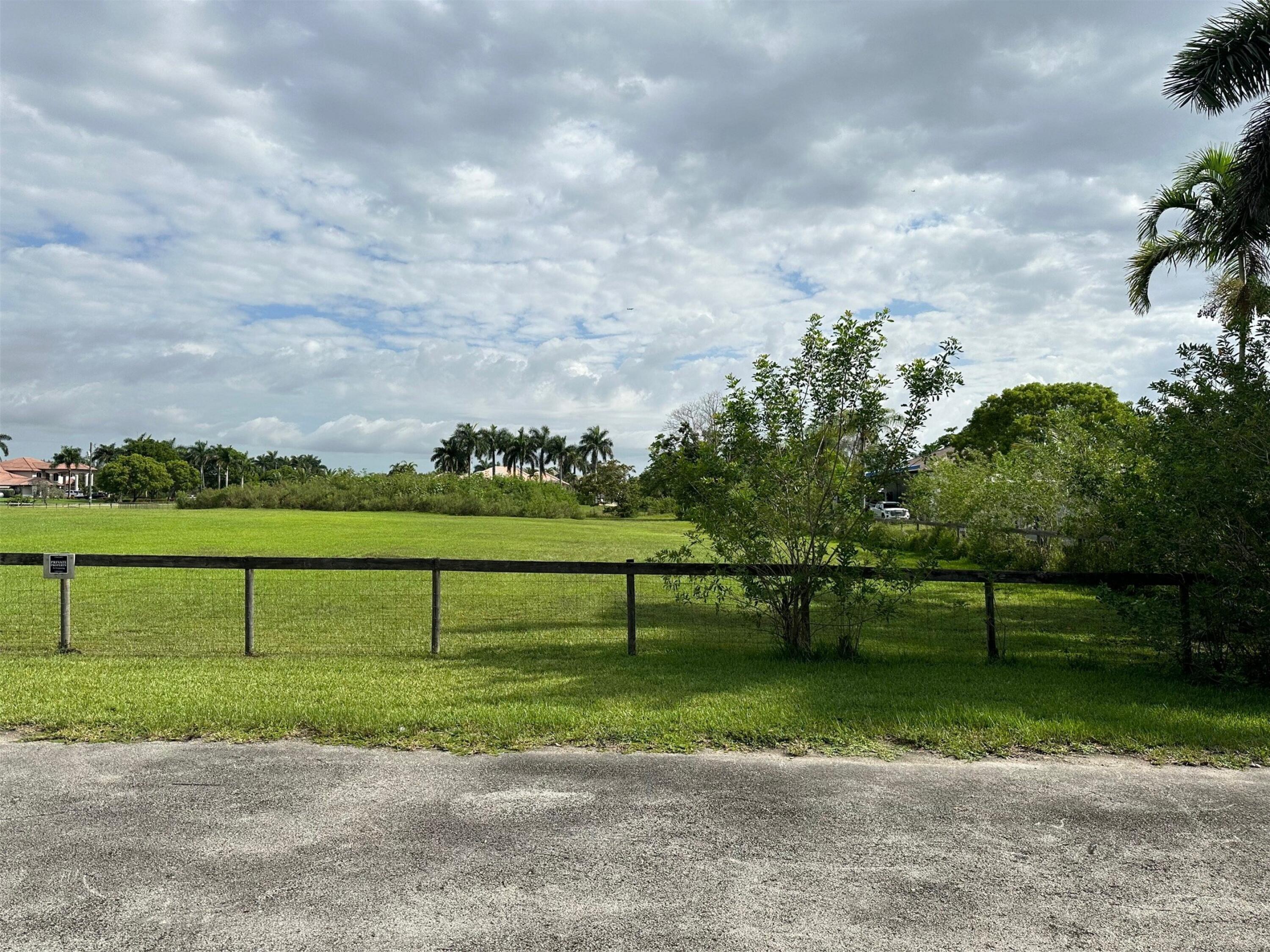 5650 Southwest 192nd Terrace Southwest Ranches, FL 33332 - Photo 6 of 29 a view of a field with sitting area