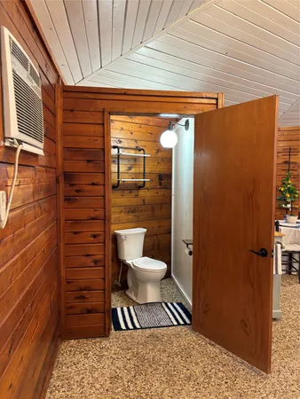 a view of kitchen with refrigerator sink cabinets and microwave