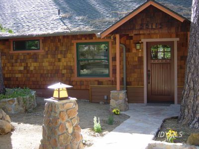 55115 Daryll Road Idyllwild, CA 92549 - Photo 1 of 1 a front view of a house with garden