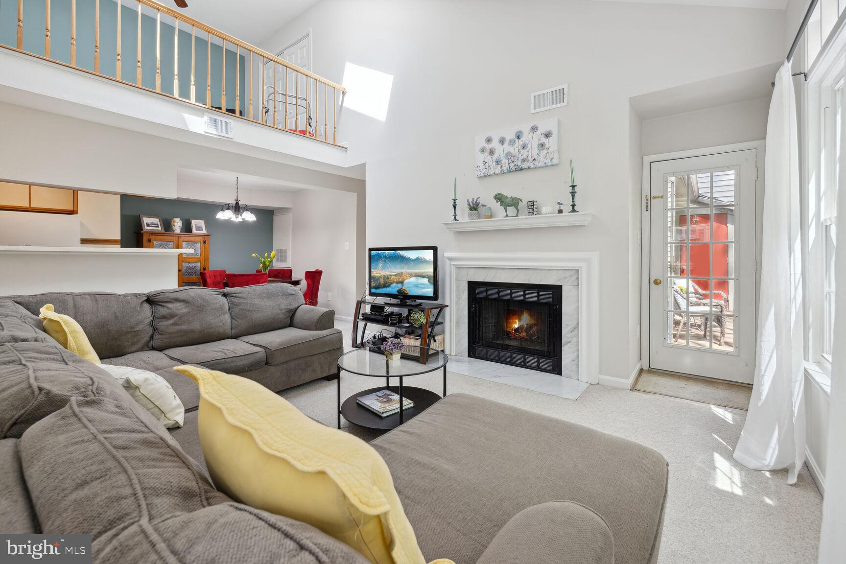 2221 Lovedale Lane, Unit 206B Reston, VA 20191 - Photo 5 of 33 FAMILY ROOM VAULTED CEILINGS