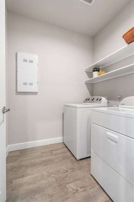 1864 Mensa Drive Haslet, TX 76052 - Photo 21 of 40 a utility room with dryer and washer