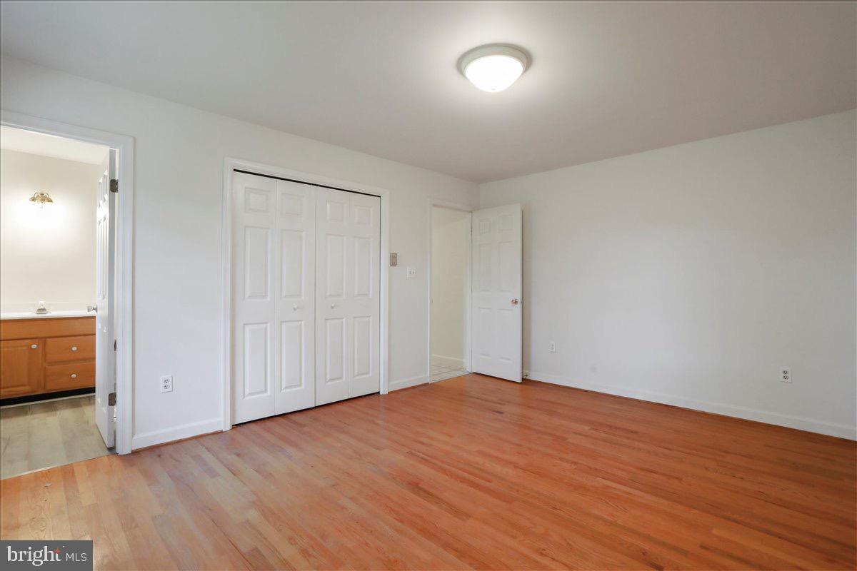 246 Poets Lane Inwood, WV 25428 - Photo 24 of 32 a view of empty room with wooden floor