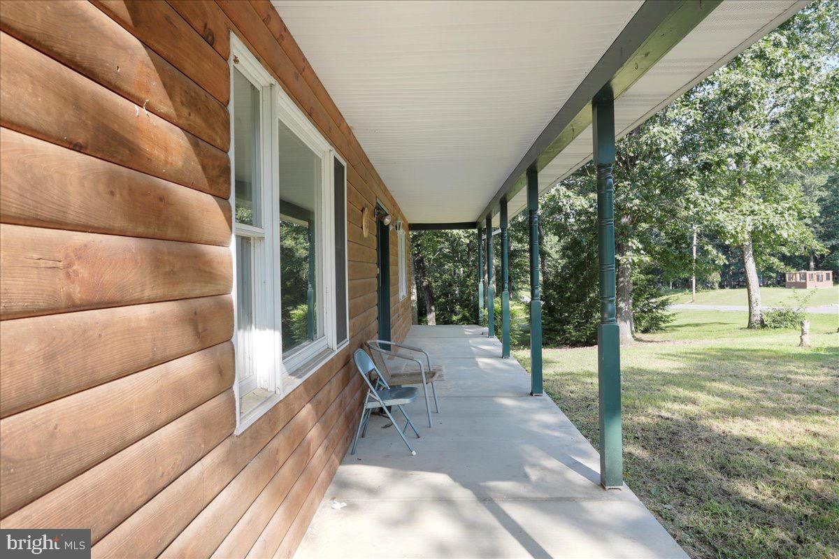 246 Poets Lane Inwood, WV 25428 - Photo 5 of 32 a view of an outdoor space with seating area