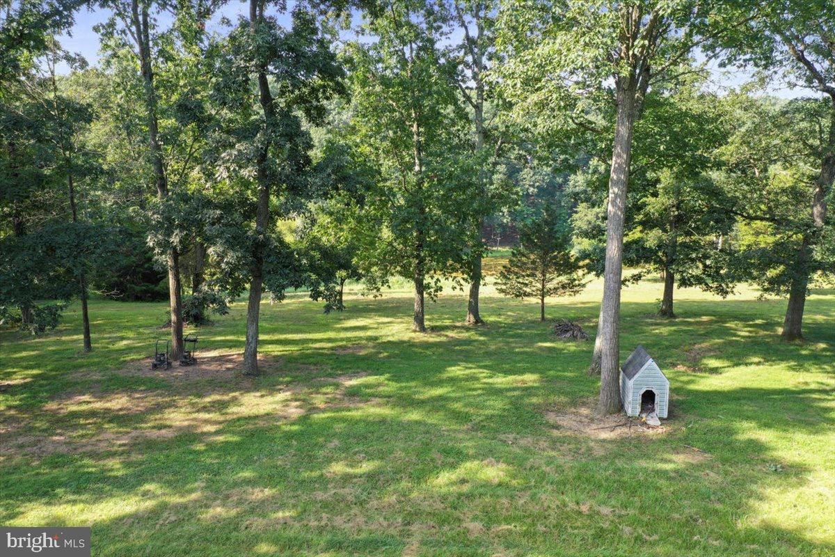 246 Poets Lane Inwood, WV 25428 - Photo 8 of 32 a lake view with a sitting space