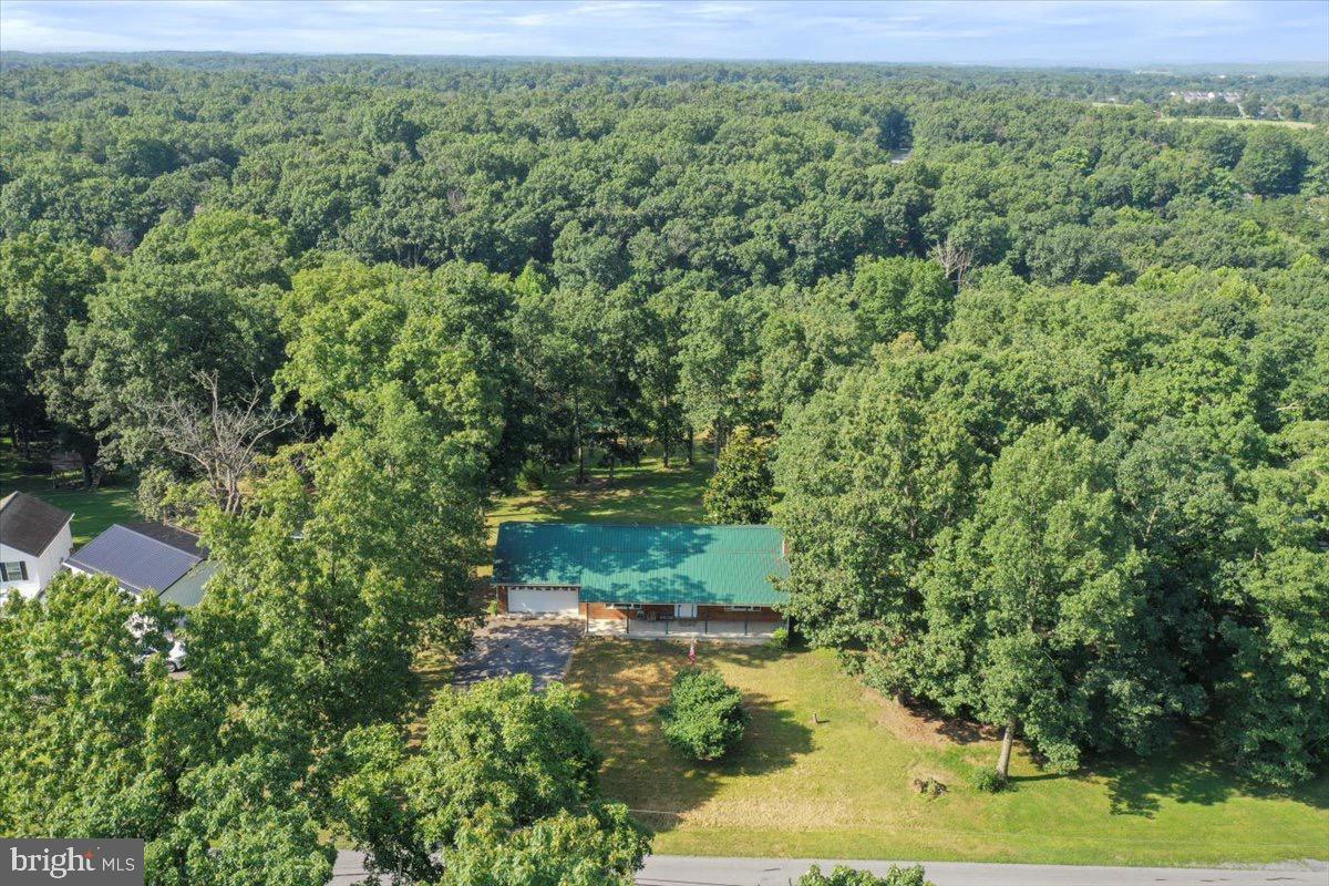 246 Poets Lane Inwood, WV 25428 - Photo 10 of 32 an aerial view of a house with a yard