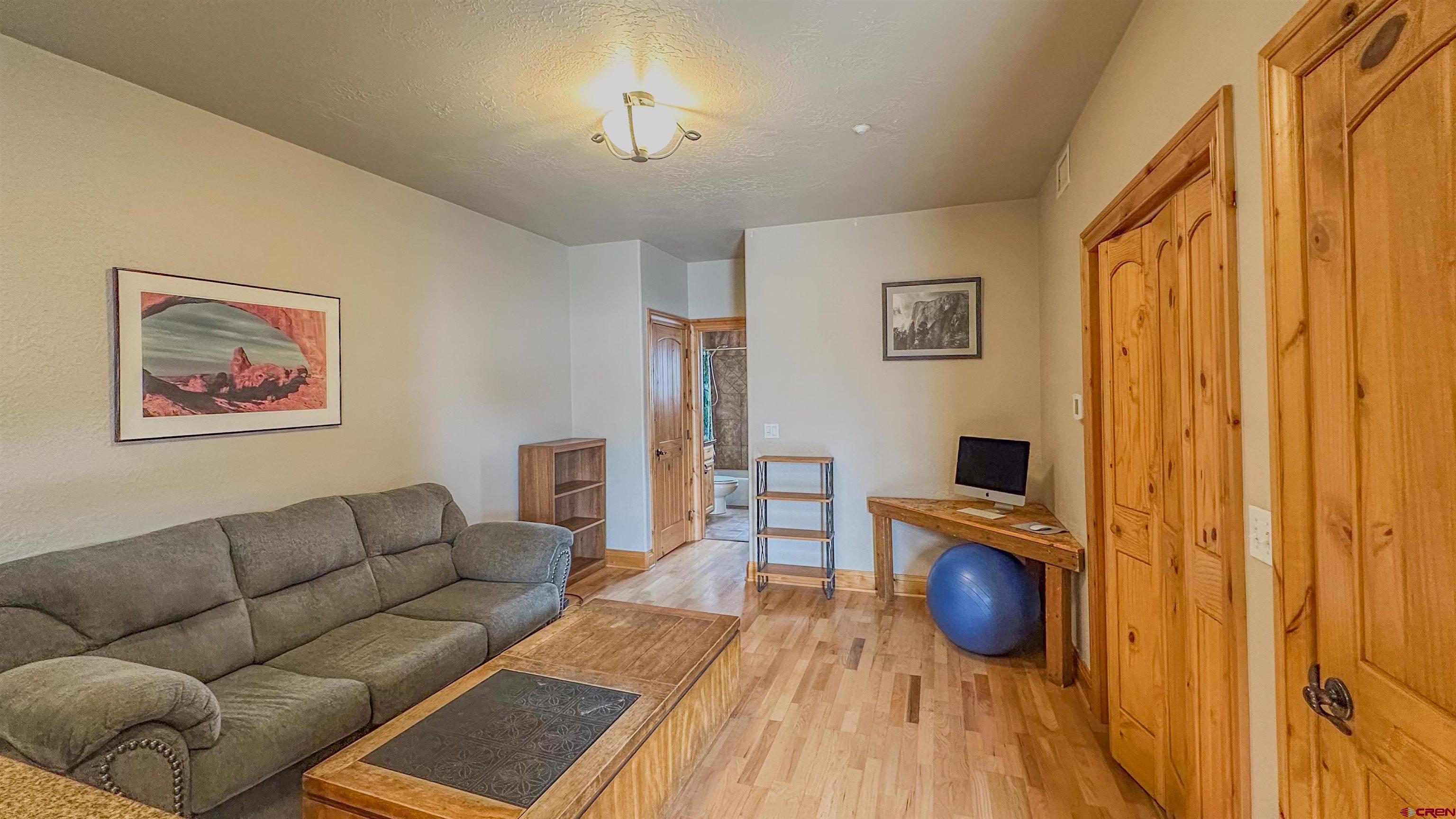 2855 Main Avenue, Unit A 209 Durango, CO 81301 - Photo 6 of 20 a living room with furniture and a wooden floor