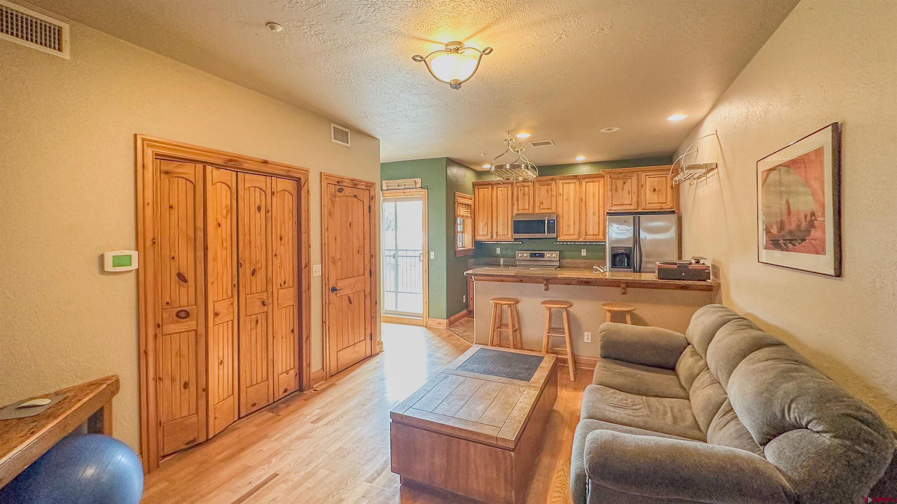 2855 Main Avenue, Unit A 209 Durango, CO 81301 - Photo 7 of 20 a living room with furniture and a large window