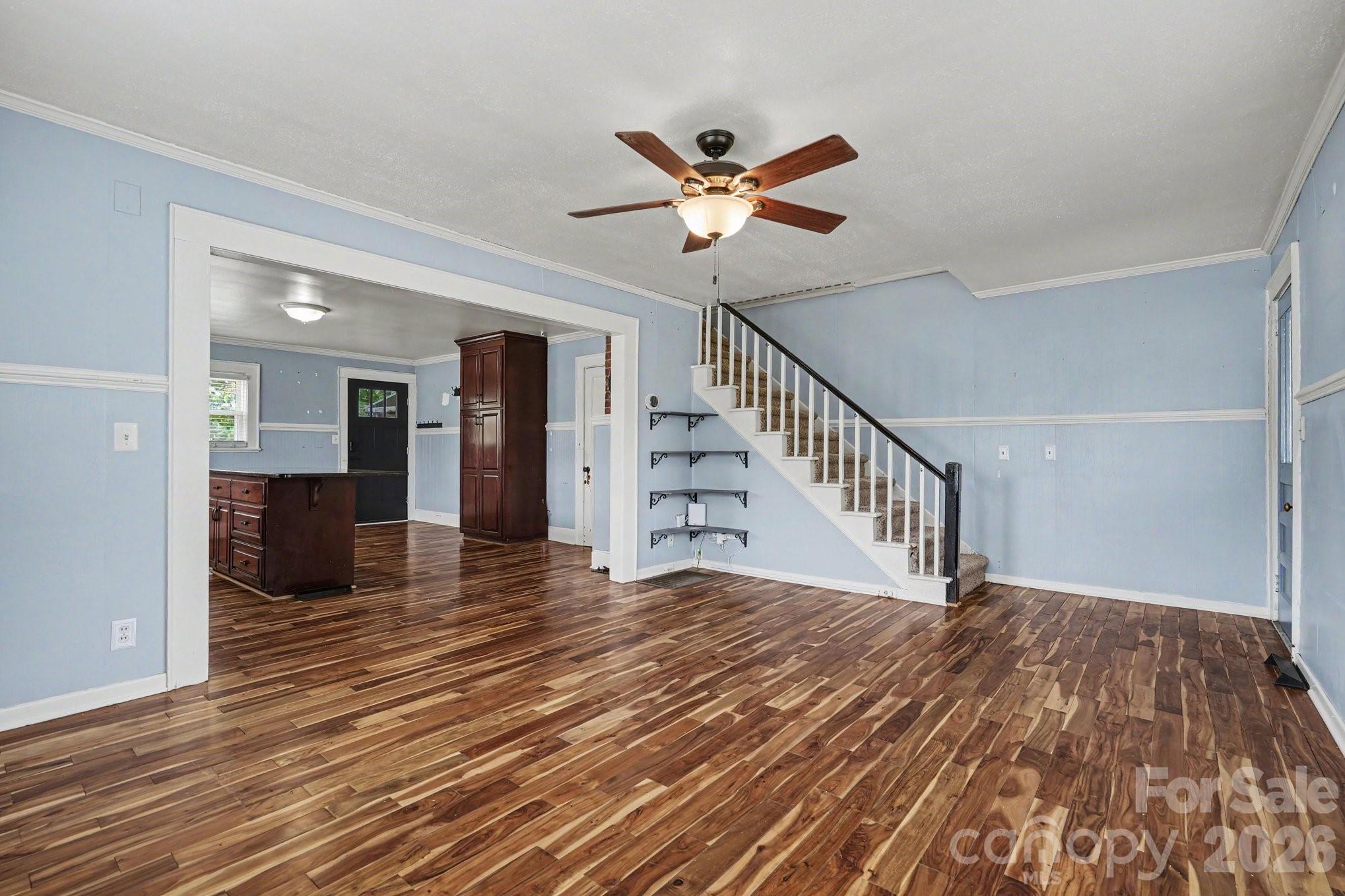 24359 Ridgecrest Road Locust, NC 28097 - Photo 4 of 26 a view of entryway and hall with wooden floor