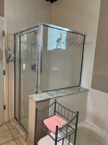 a view of a livingroom with furniture and staircase