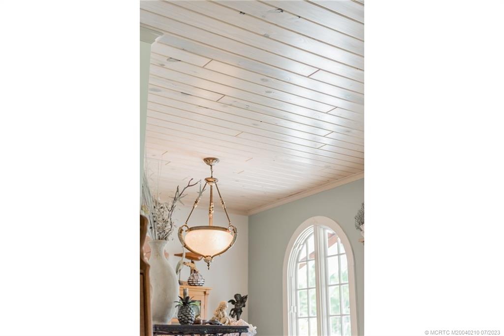 4171 Southeast Robert Loop Road Stuart, FL 34997 - Photo 7 of 27 a very nice looking room with a large window