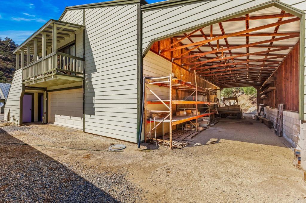 29533 Anthony Road Valley Center, CA 92082 - Photo 13 of 71 View of covered shed that runs the length of the garage.