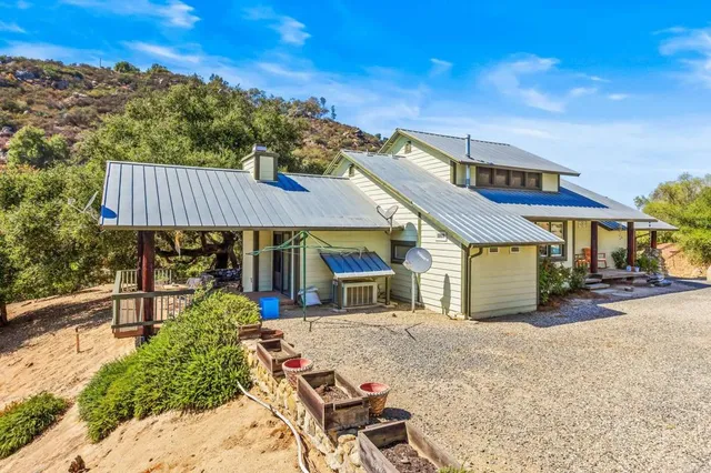 a view of balcony with couch and wooden floor