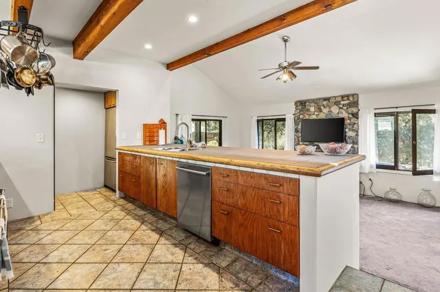 a bedroom with a bed and a table in it