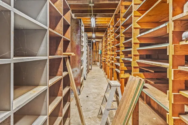 a kitchen with stainless steel appliances granite countertop a stove a refrigerator and a microwave