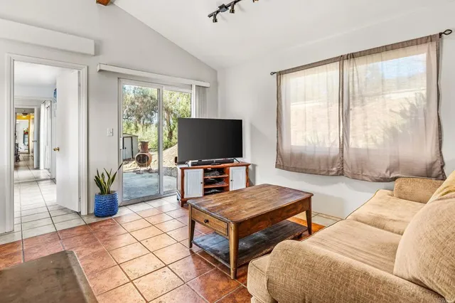 a bathroom with a sink toilet and mirror