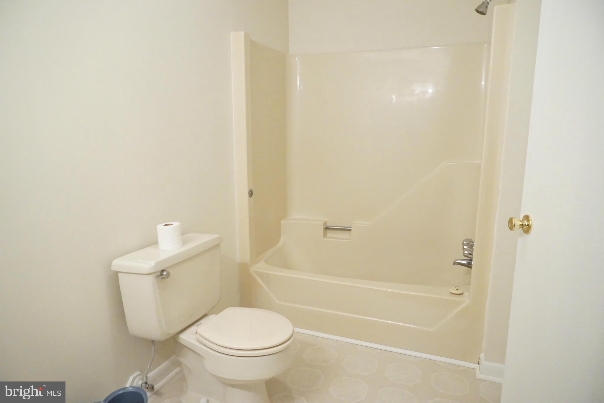 11670 Perry Branch Road Newburg, MD 20664 - Photo 19 of 30 a white toilet sitting next to a bath tub