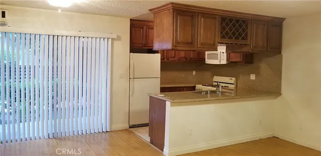 $379,900 | 18530 Hatteras Street, Unit 102, Tarzana, CA 91356