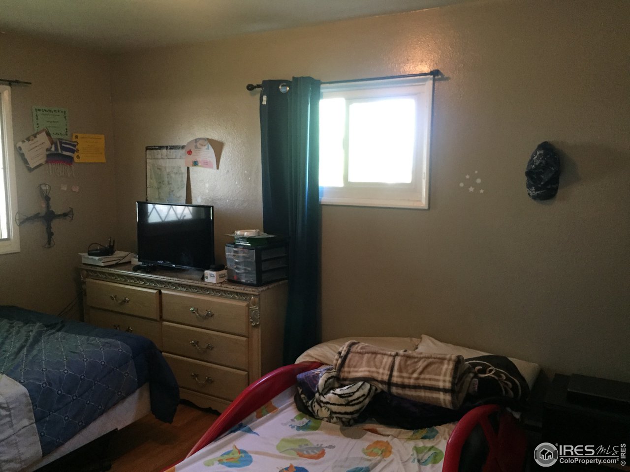 2522 25th Street Road Greeley, CO 80634 - Photo 14 of 28 main level bedroom