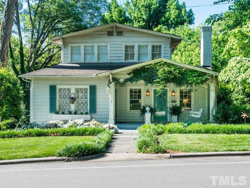 2320 Anderson Drive Raleigh, NC 27608 - Photo 1 of 25 front view of a house with a yard