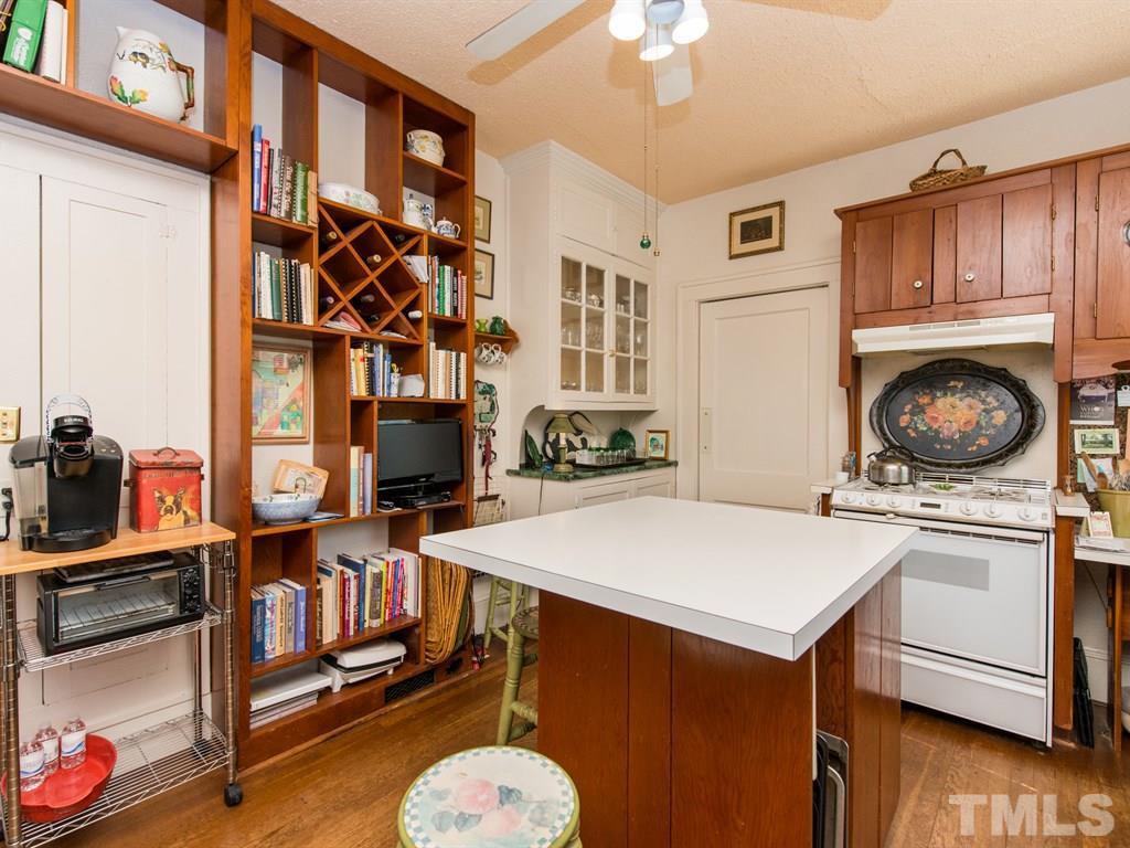 2320 Anderson Drive Raleigh, NC 27608 - Photo 12 of 25 a view of a kitchen with workspace and living room