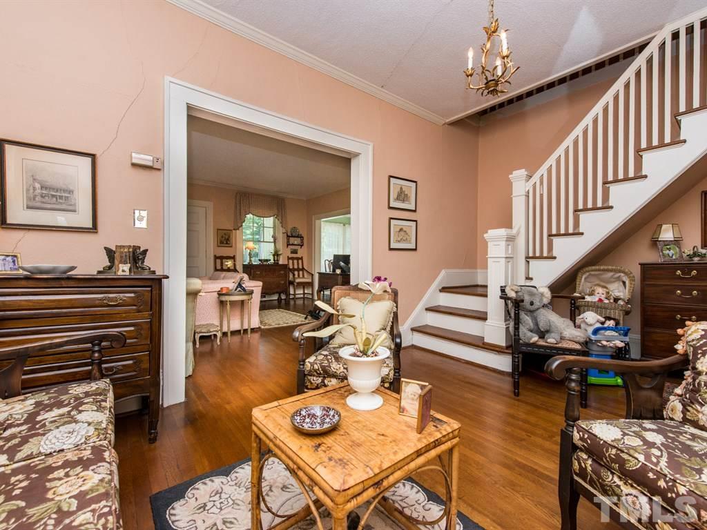 2320 Anderson Drive Raleigh, NC 27608 - Photo 13 of 25 a living room with furniture and a dining table