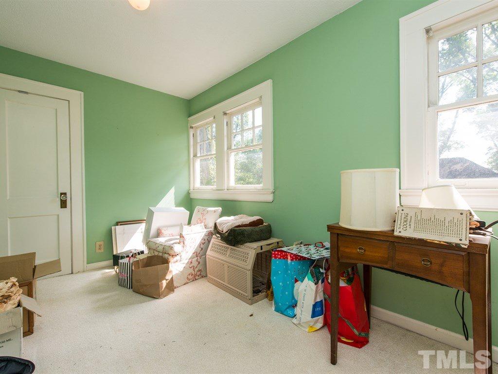 2320 Anderson Drive Raleigh, NC 27608 - Photo 20 of 25 a bedroom with a workspace