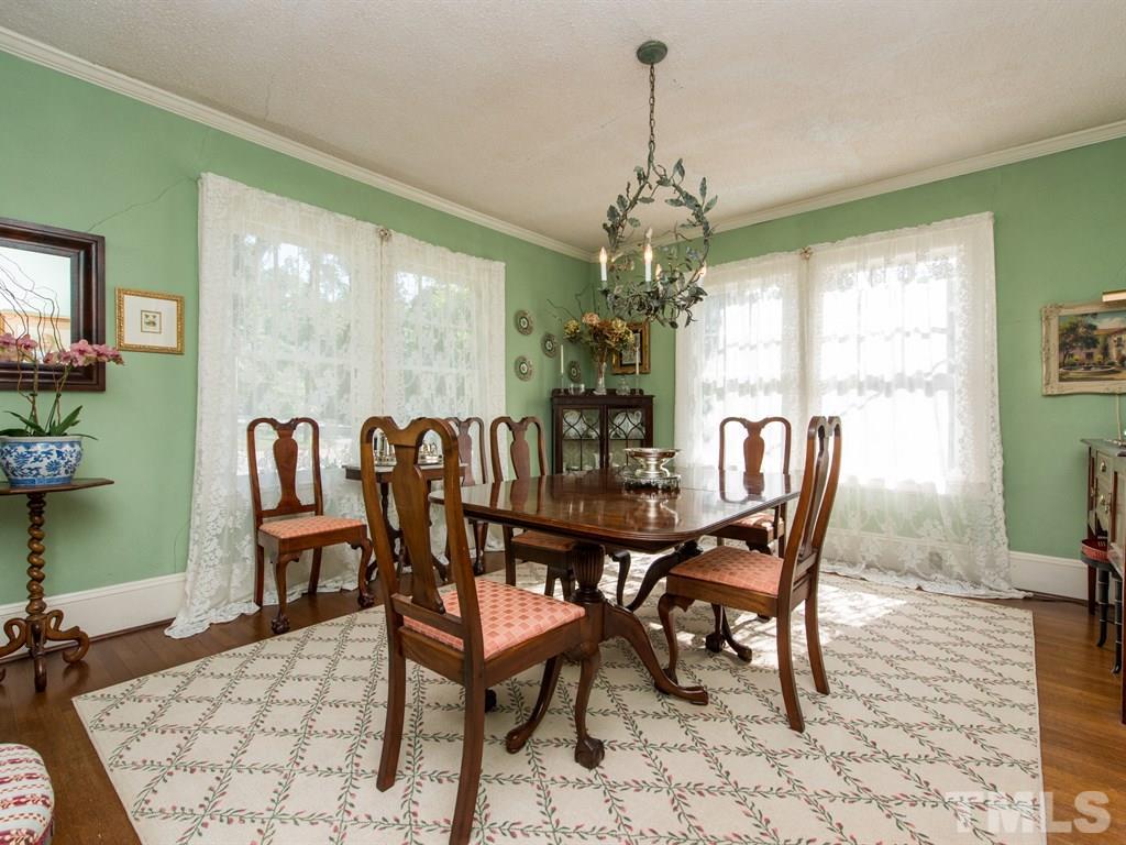 2320 Anderson Drive Raleigh, NC 27608 - Photo 7 of 25 a view of a dining room with furniture window and outside view