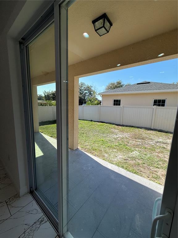 2314 Apache Avenue Kissimmee, FL 34744 - Photo 15 of 29 a view of an empty room and window
