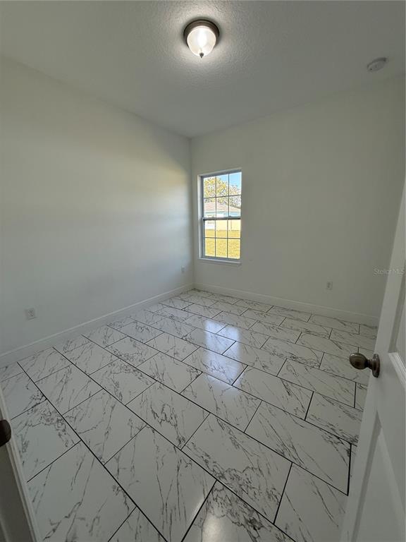 2314 Apache Avenue Kissimmee, FL 34744 - Photo 21 of 29 a view of a room and window
